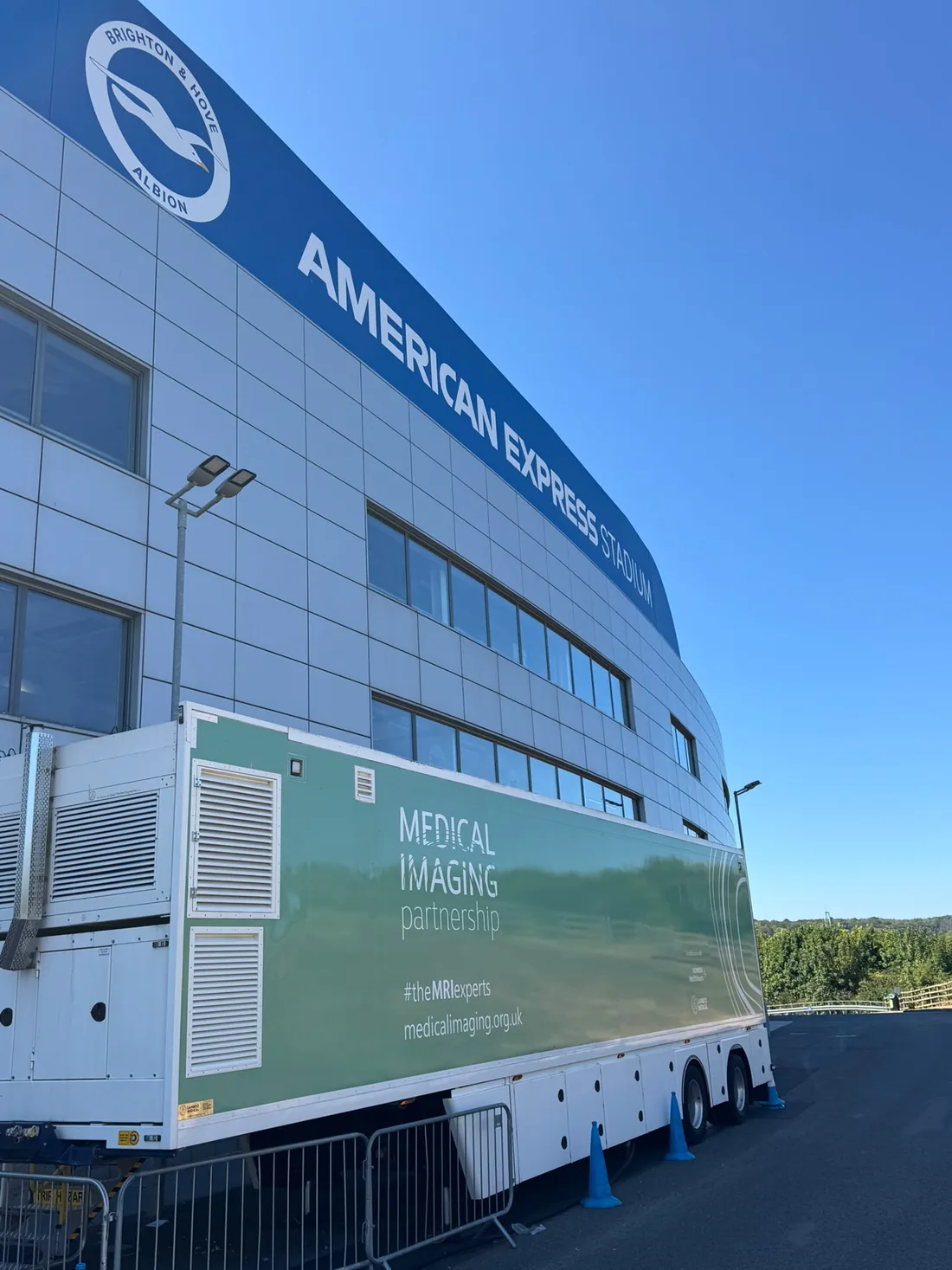 A Medical Imaging Partnership mobile MRI unit deployed alongside the American Express Stadium in Brighton